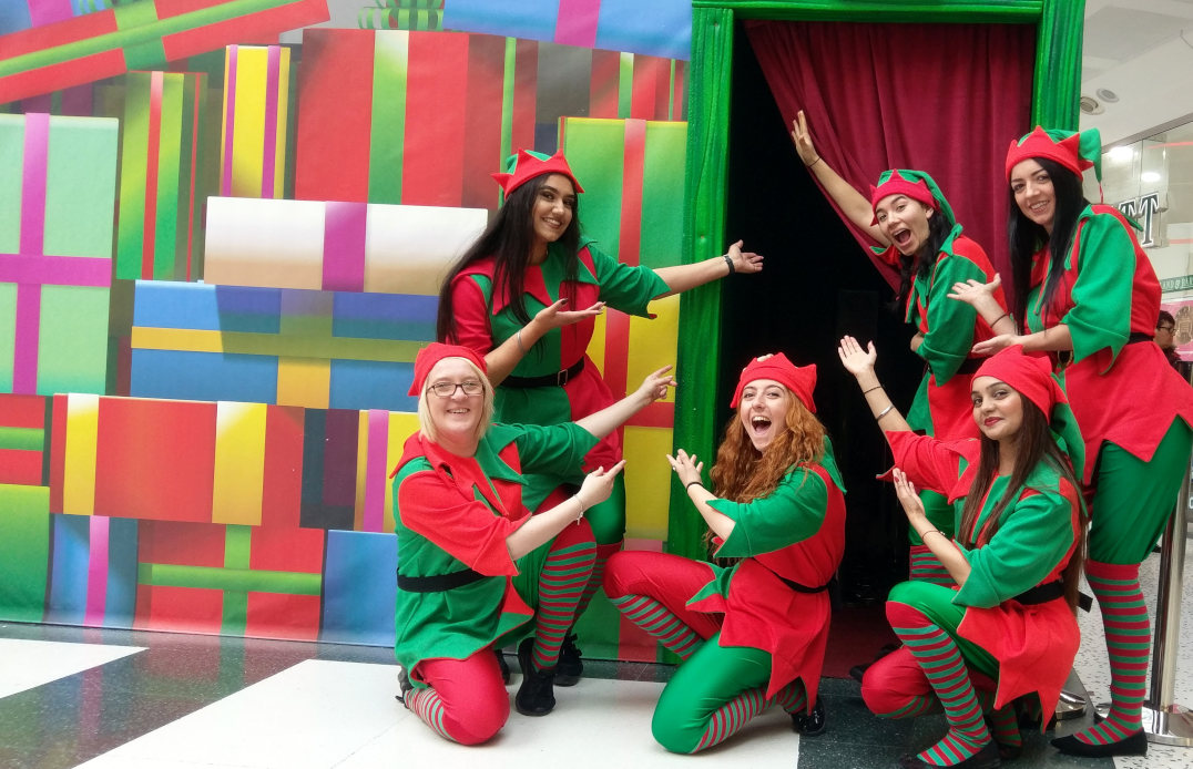 Santas Elves in front of Grotto